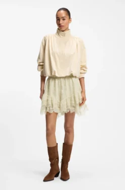 Mini skort in ruffled lace
