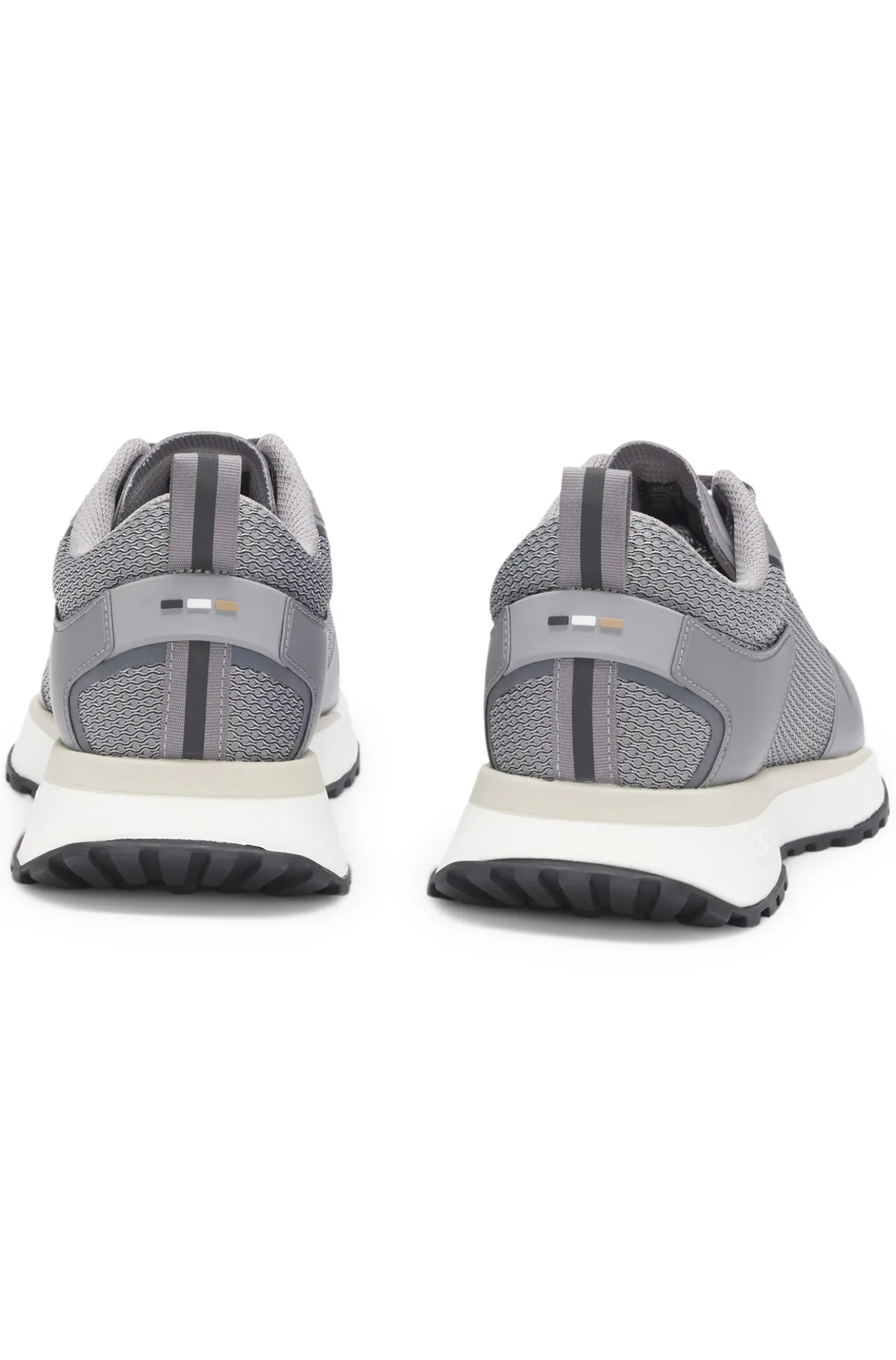 Mixed-material trainers with mesh details and branding