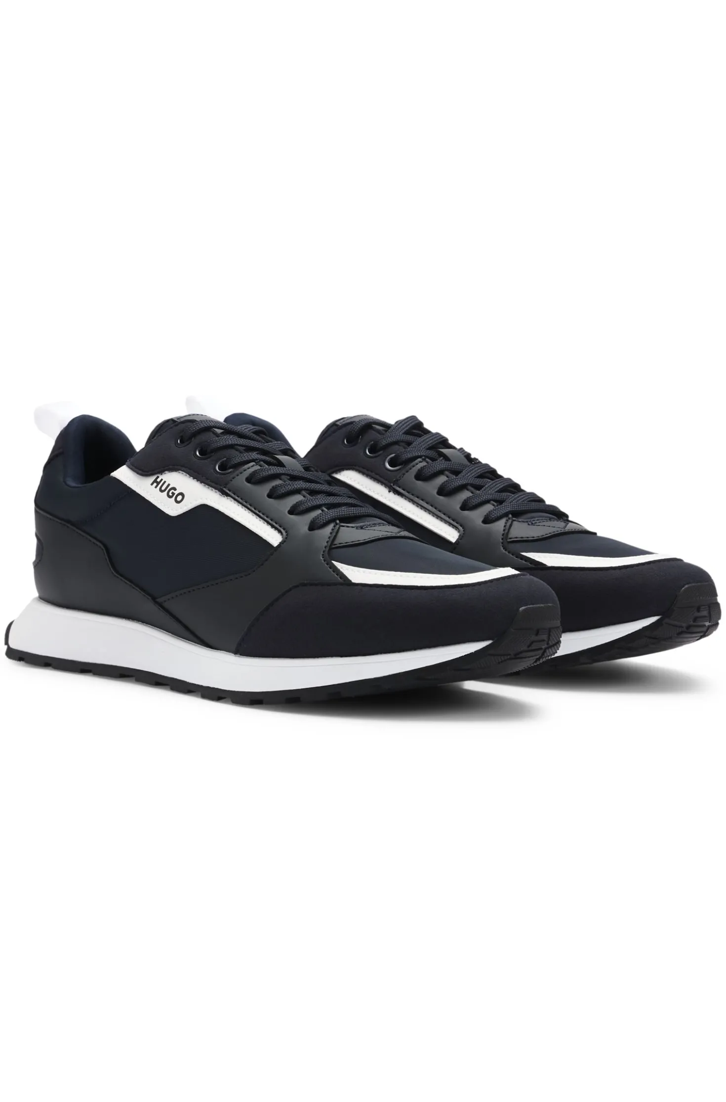 Mixed-material trainers with branded accents
