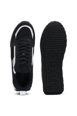 Mixed-material trainers with branded accents