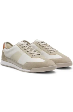 Mixed-material trainers with ridged outsole