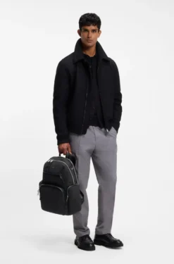 Multi-pocket backpack with leather trims