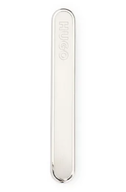 Oval-shaped tie clip with engraved logo
