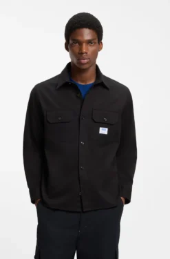 Oversized-fit shirt in cotton with flap chest pockets
