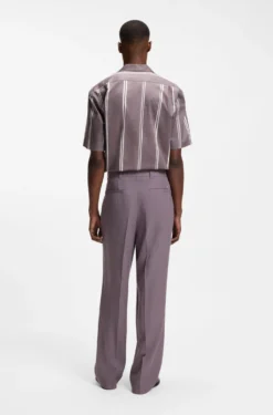 Oversized-fit trousers in draped twill