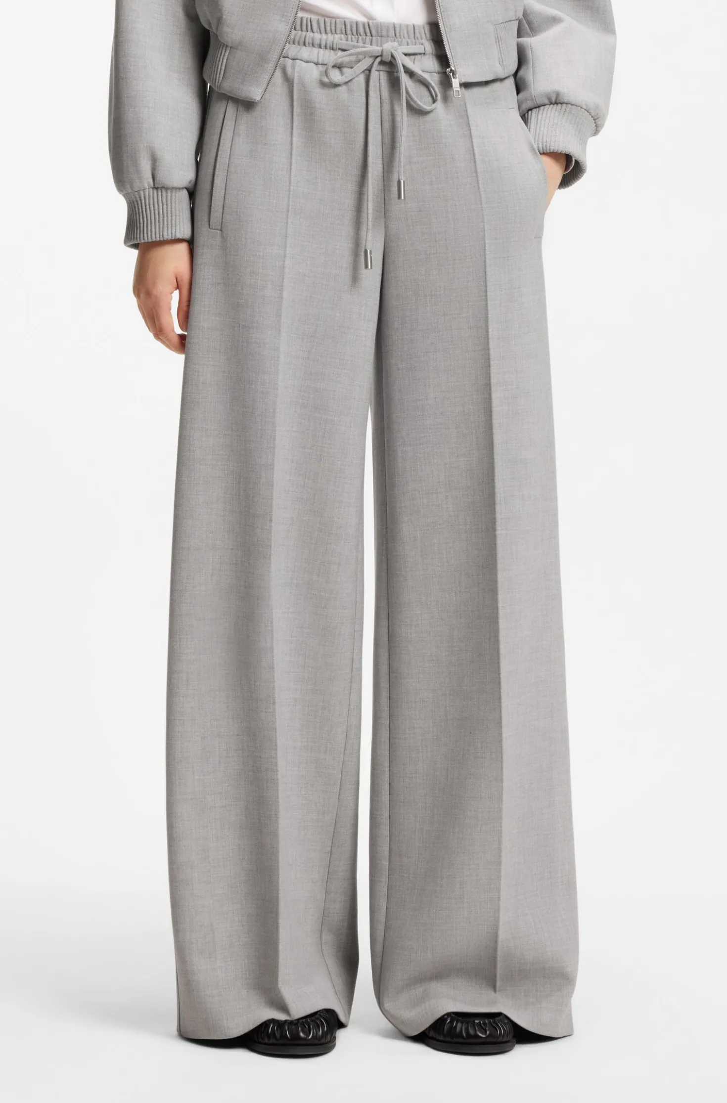 Oversized-fit trousers in melange stretch twill