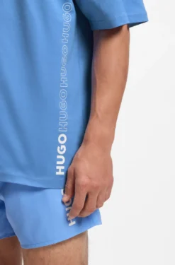 Oversized-fit T-shirt in cotton with repeat-logo print