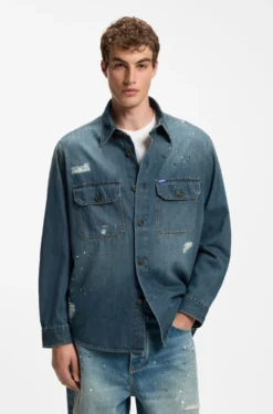 Oversize-fit denim overshirt with paint splashes