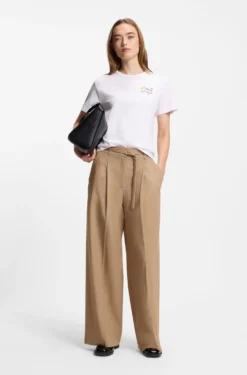 Pleat-front trousers with buckled belt