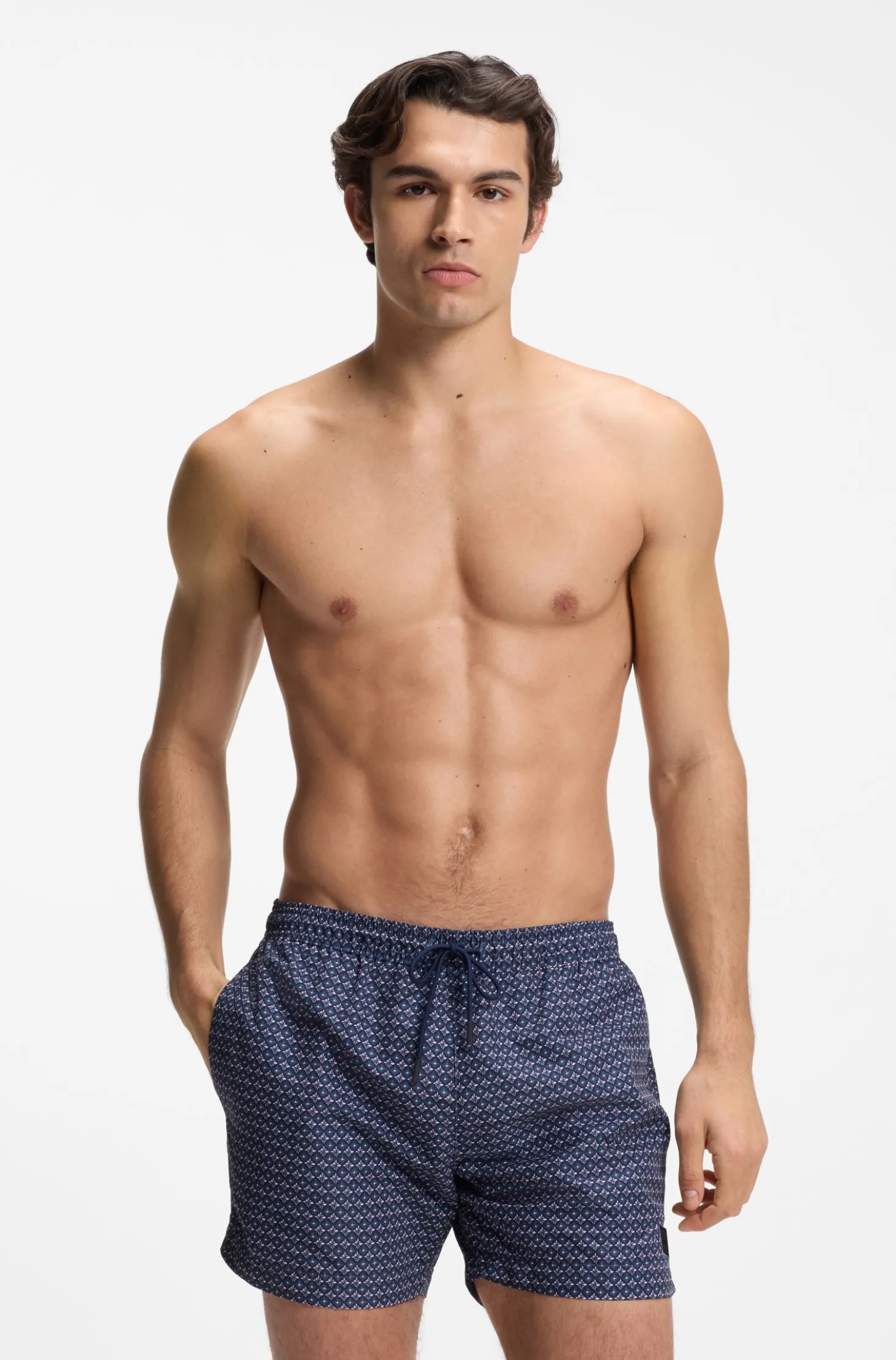 Printed swim shorts with logo badge