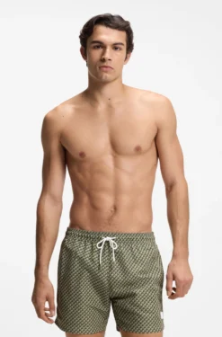 Printed swim shorts with logo badge