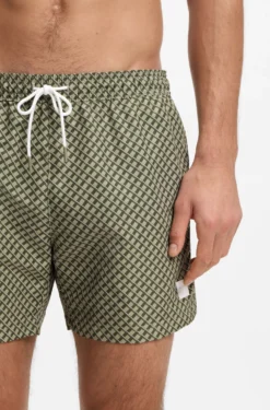 Printed swim shorts with logo badge