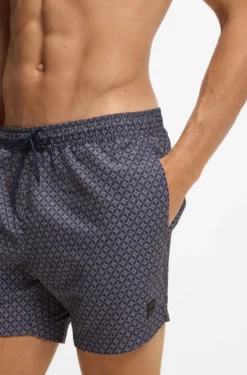 Printed swim shorts with logo badge