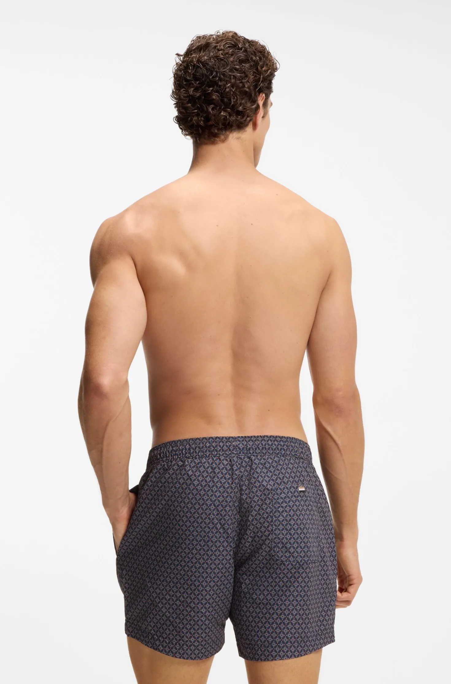 Printed swim shorts with logo badge