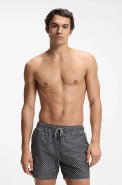 Printed swim shorts with logo badge