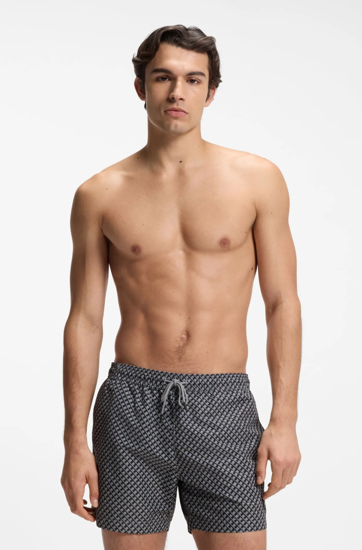 Printed swim shorts with logo badge