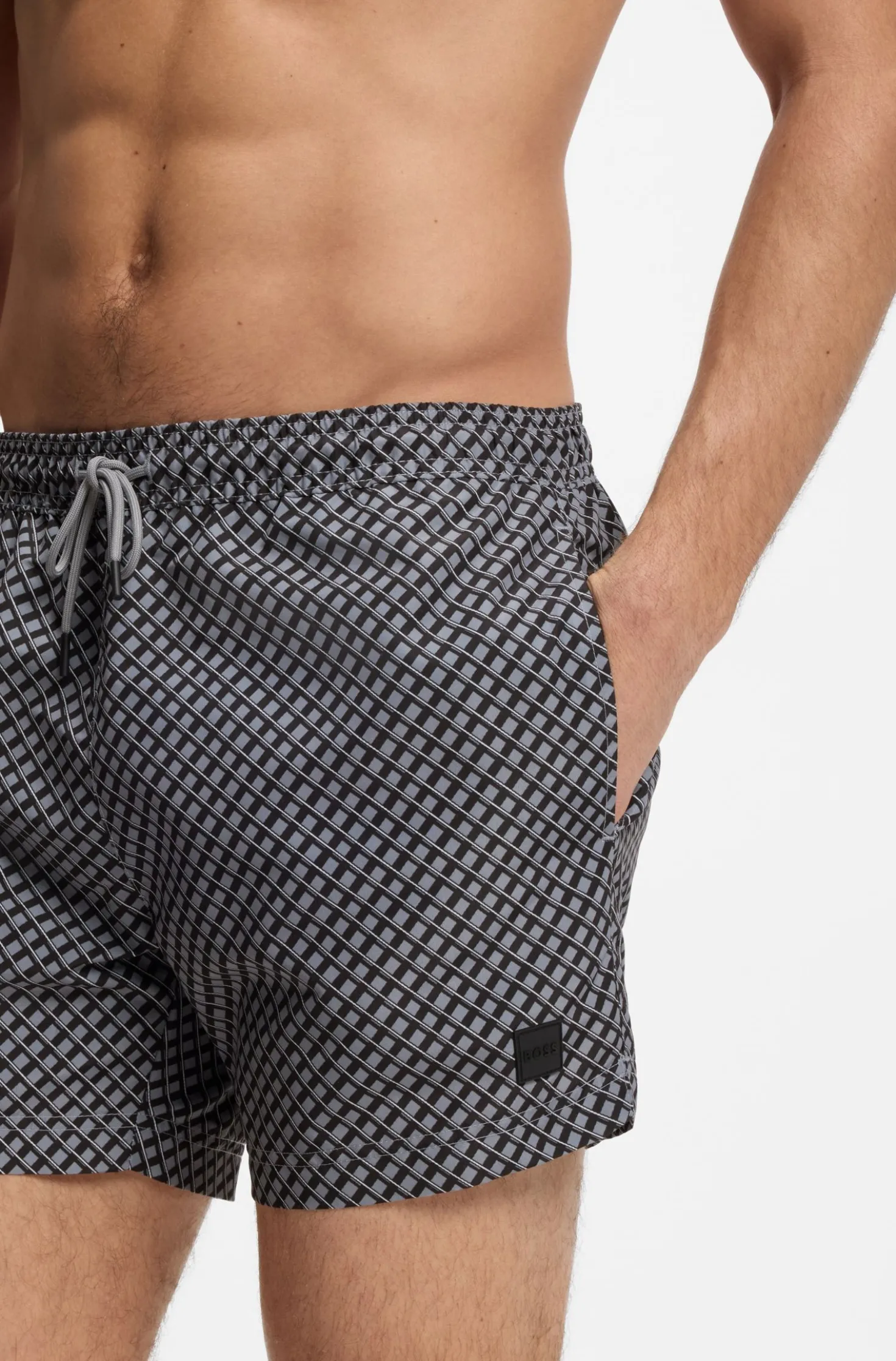 Printed swim shorts with logo badge