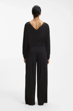 Pyjama bottoms with lace-trimmed pockets