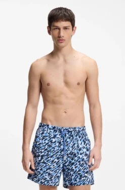 Quick-dry swim shorts with all-over print