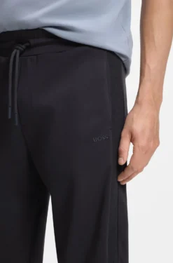 Regular-fit jersey trousers with jacquard tape