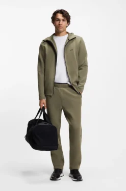 Regular-fit tracksuit bottoms in super-soft stretch fabric