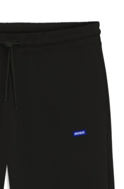 Regular-fit tracksuit bottoms in French-terry cotton