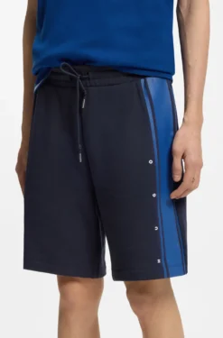 Relaxed-fit shorts in cotton terry with side stripe
