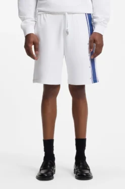 Relaxed-fit shorts in cotton terry with side stripe