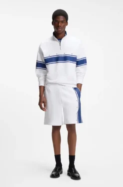 Relaxed-fit shorts in cotton terry with side stripe