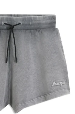 Relaxed-fit shorts in cotton terry with embossed logo