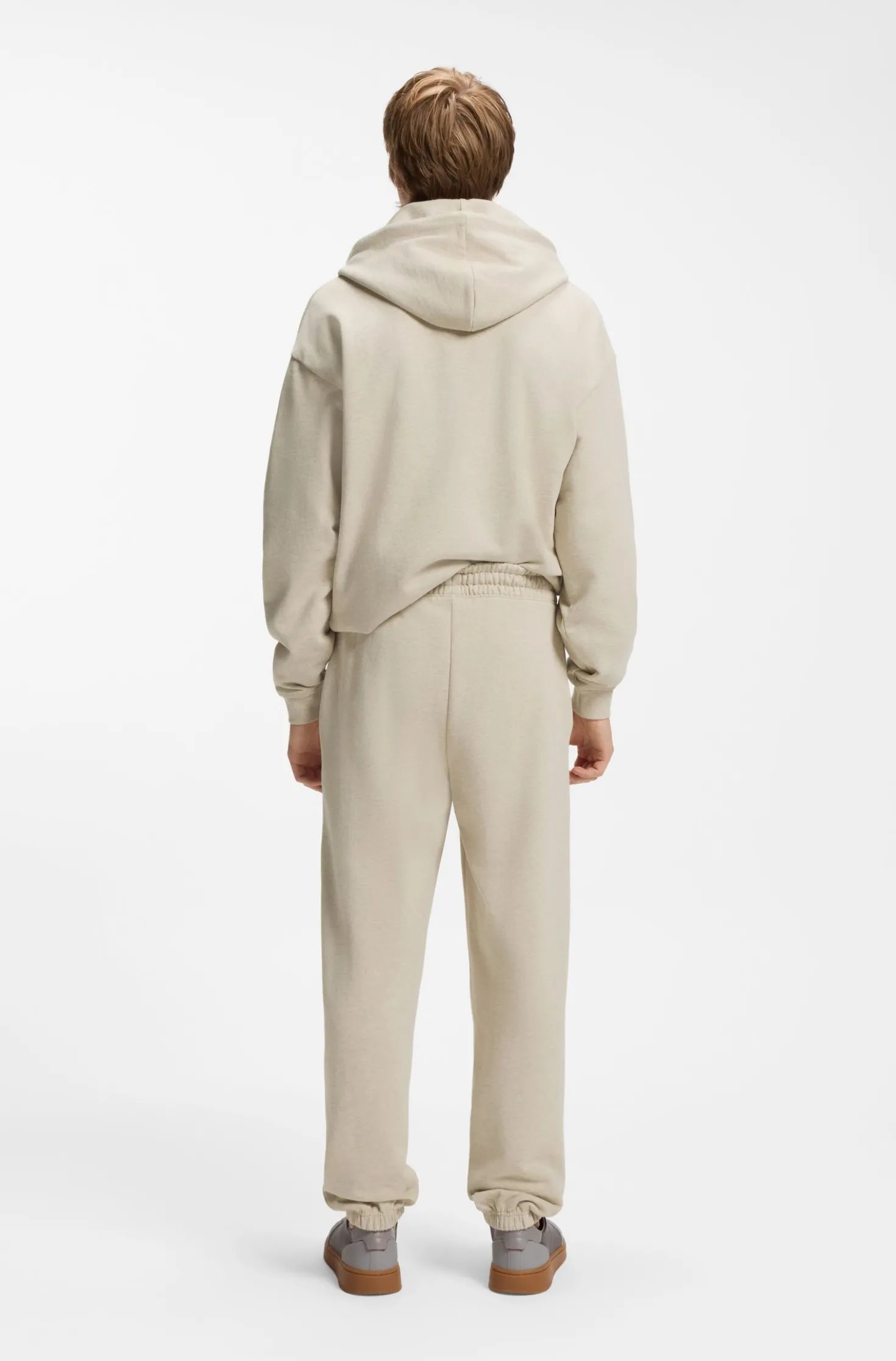 Relaxed-fit tracksuit bottoms in cotton with logo trim