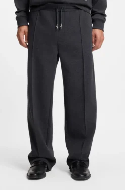 Relaxed-fit tracksuit bottoms with pintuck pleats