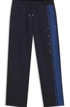 Relaxed-fit tracksuit bottoms in cotton with side stripe