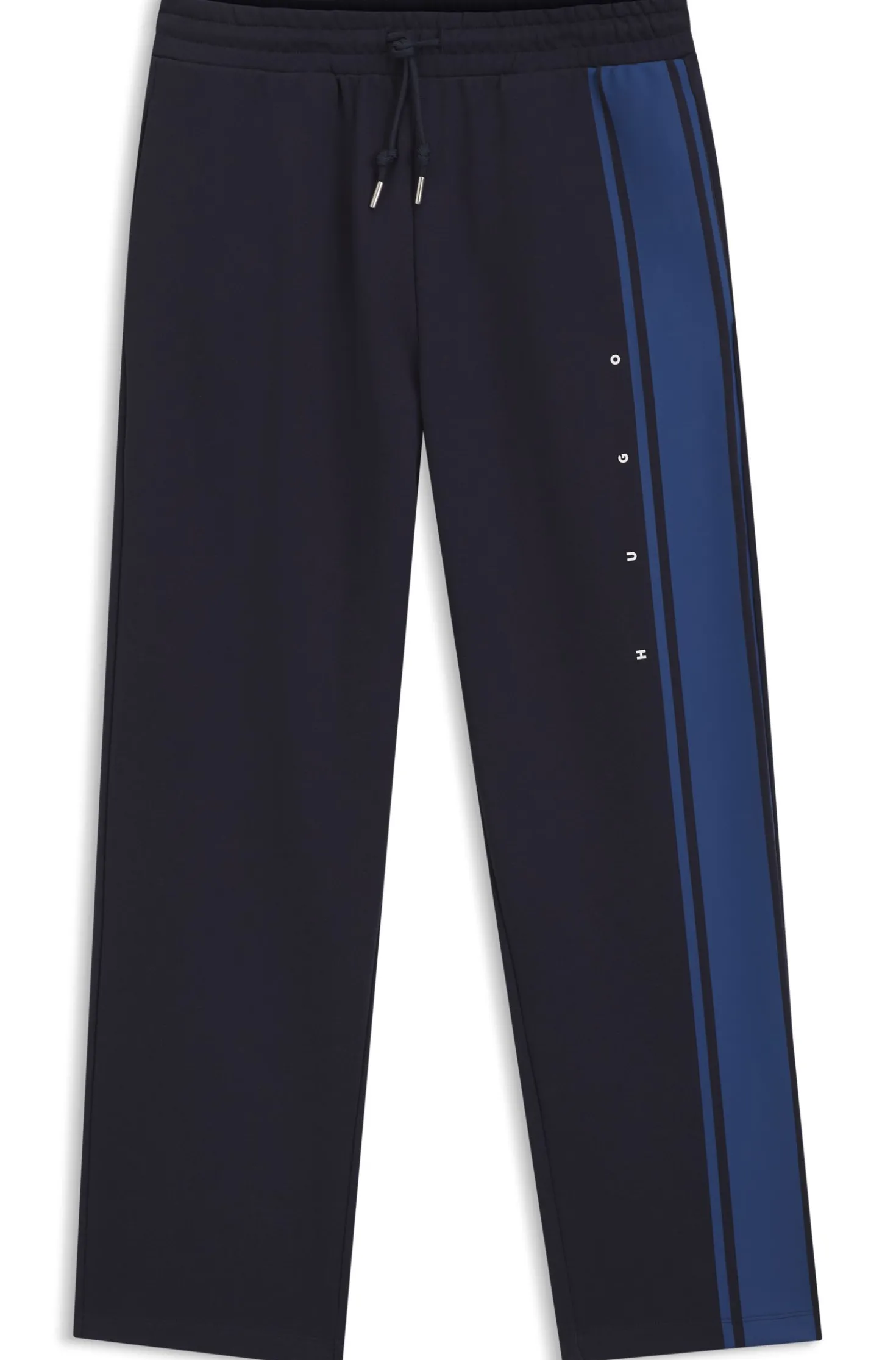 Relaxed-fit tracksuit bottoms in cotton with side stripe