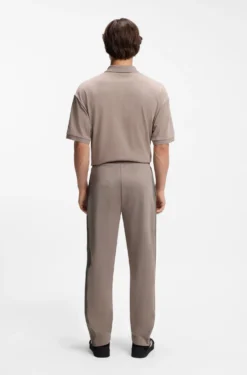 Relaxed-fit tracksuit bottoms with logo tape