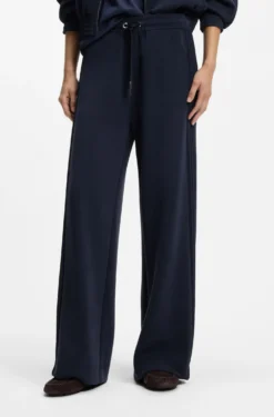 Relaxed-fit tracksuit bottoms with piping details