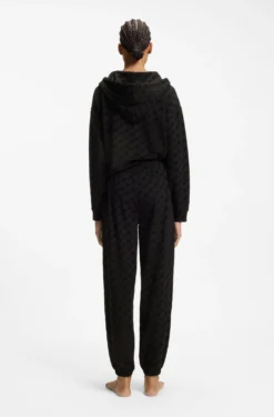 Relaxed-fit tracksuit bottoms with flocked-logo print