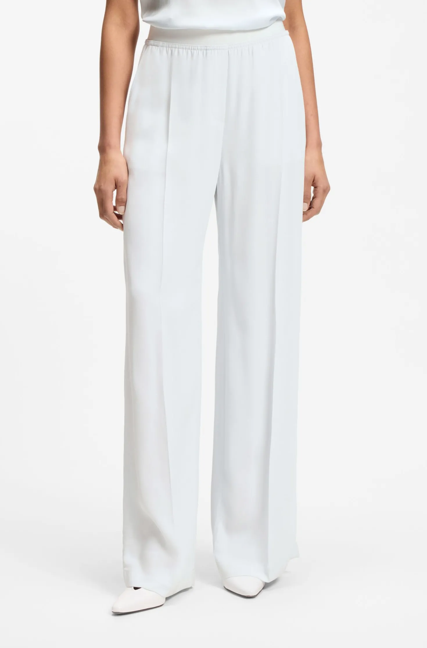 Relaxed-fit trousers in fluid crepe