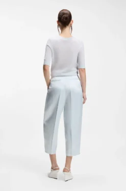 Relaxed-fit trousers in sateen with front pleats
