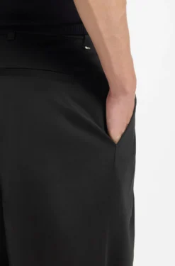 Relaxed-fit trousers in stretch cotton