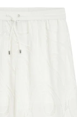 Relaxed-fit trousers with embroidered flowers