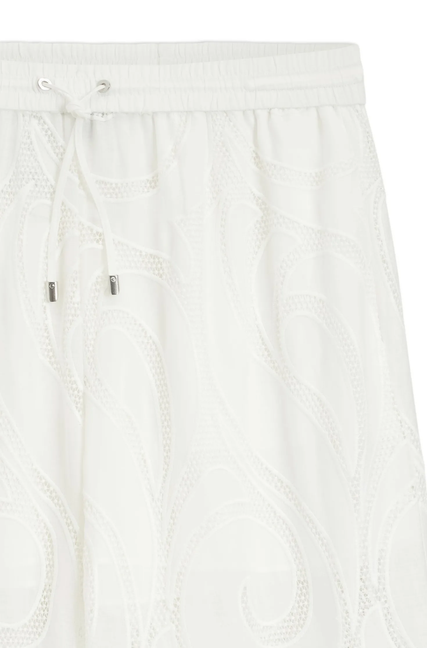 Relaxed-fit trousers with embroidered flowers