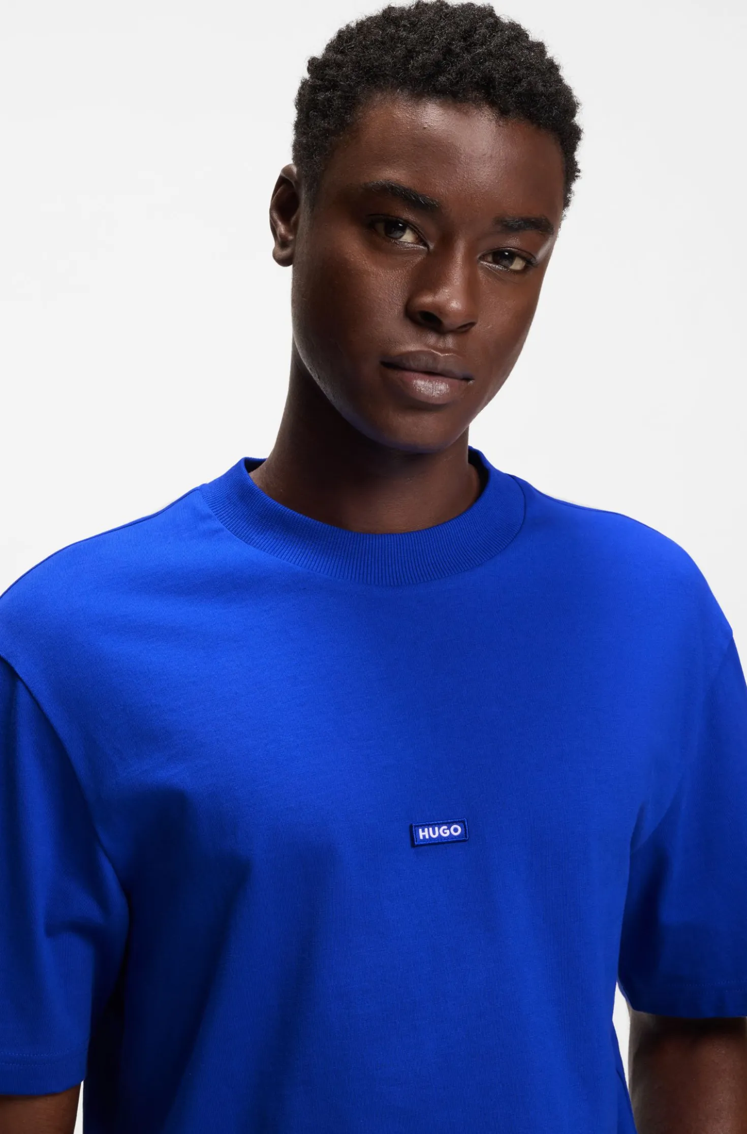 Ribbed-neck cotton T-shirt with logo badge