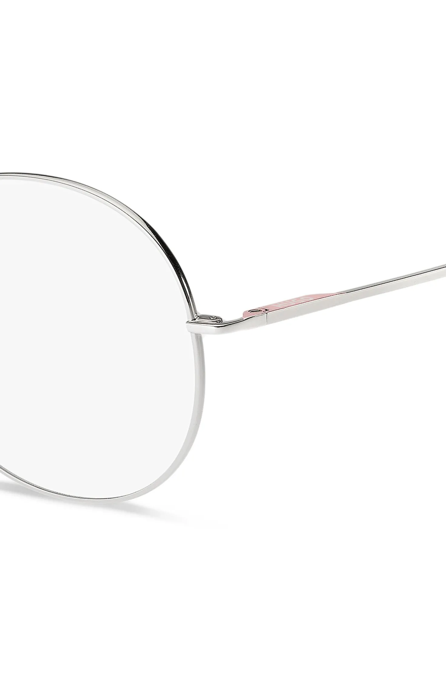 Round optical frames with rose-coloured trims