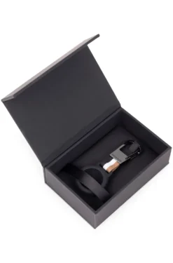 Signature-stripe key ring with AirTag holder