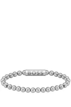 Silver-tone cuff with logo closure