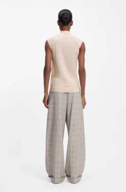 Sleeveless mock-neck sweater in merino wool