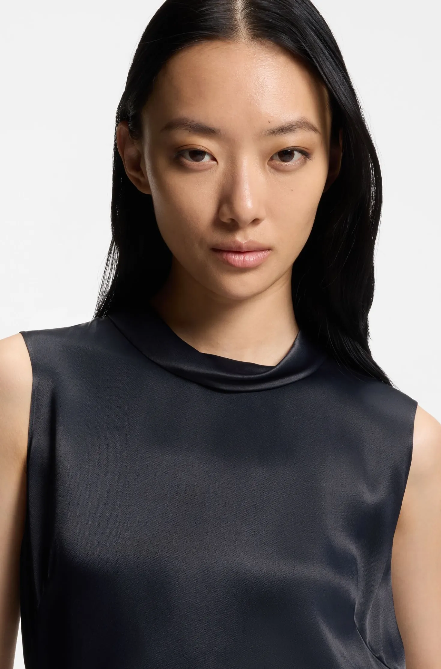 Sleeveless sateen top with keyhole rear closure