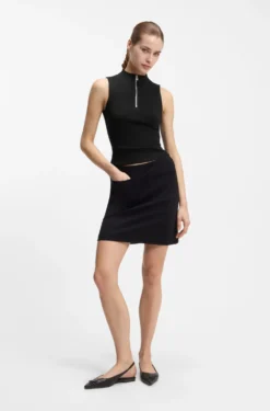 Sleeveless zip-neck top in stretch jersey
