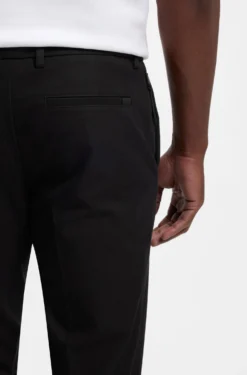 Slim-fit trousers in four-way stretch fabric